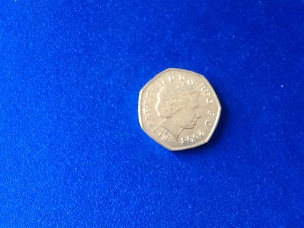 Single Fold 50.Pence Coin.